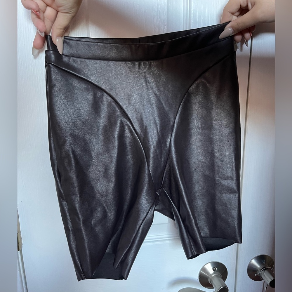 Skims black leather biker shorts